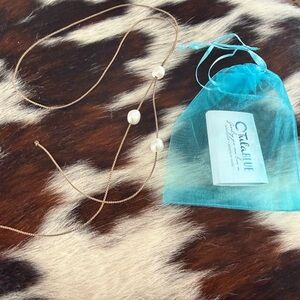 New authentic Tula tie large white pearls